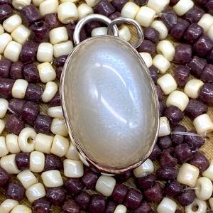 Vintage sterling silver Moonstone pendant by designer Gretta! Milky white color